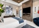 BR-003 Bedroom Fireplace Feature Wall Modern bedroom with cozy accents