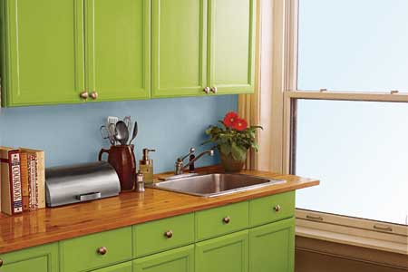 Customize your kitchen cabinets with paint, green is a great color