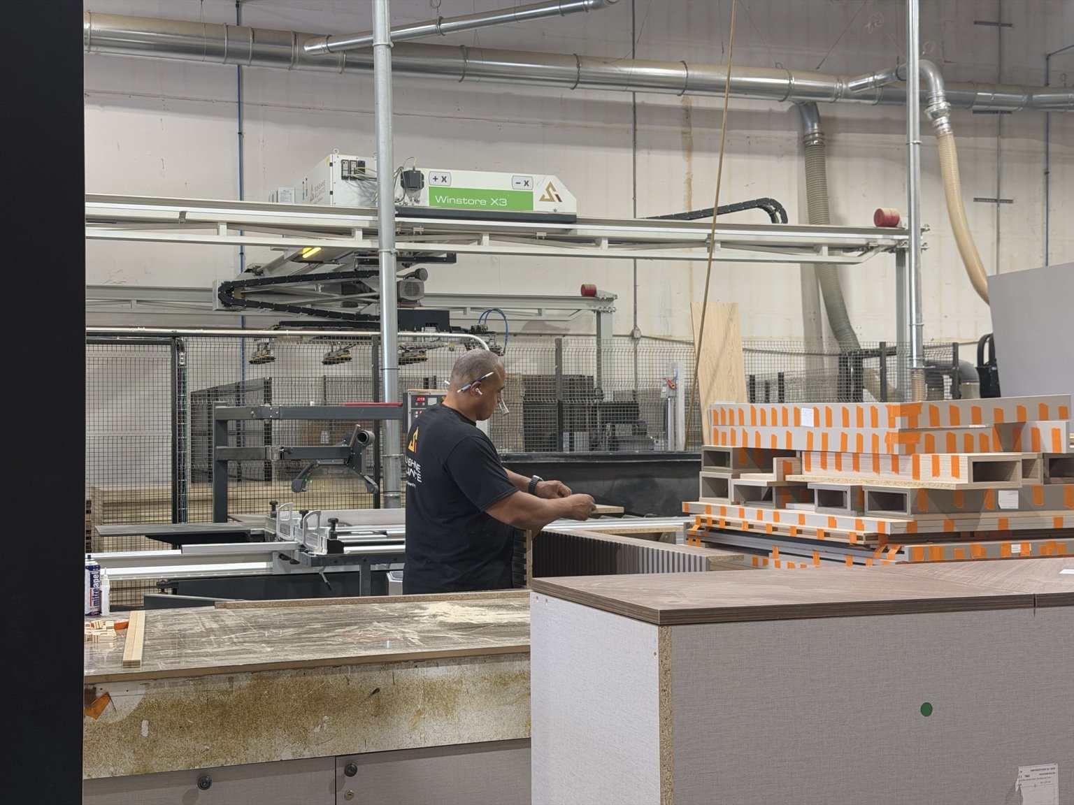 The Biesse Winstore automated panel-storage system on our floor, the kind of paid-off capital equipment a lasting shop is built on | Sunshine Alliance, Deerfield Beach FL