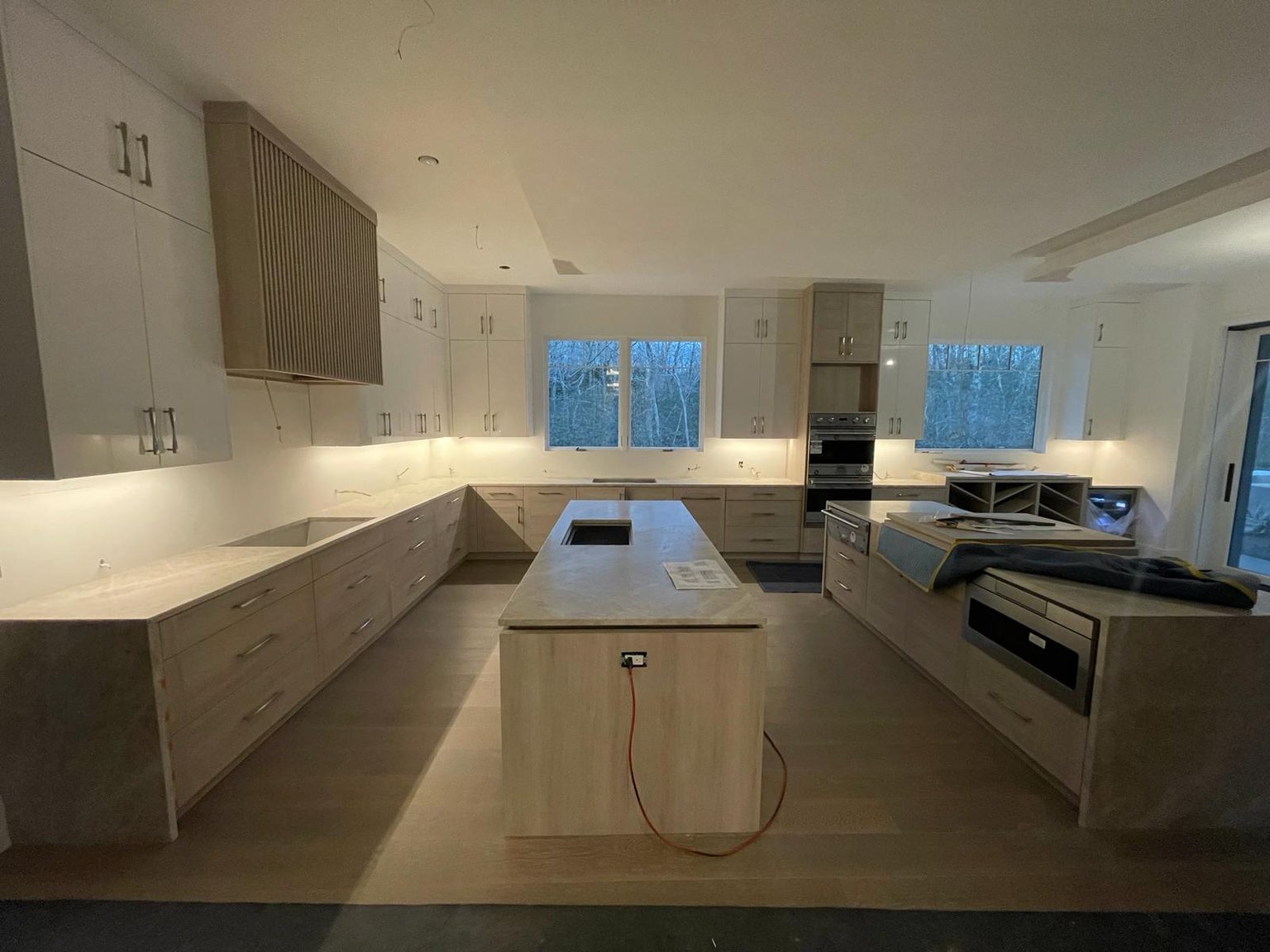 Completed custom white oak kitchen with a large island at the Hamptons project | Sunshine Alliance, Hamptons NY