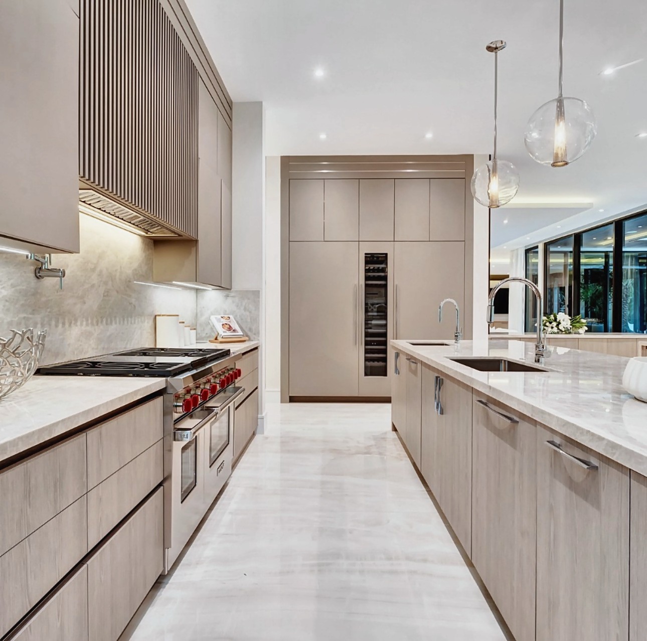 Flush-build integrated kitchen appliances reading as one continuous run of cabinetry, Sunshine Alliance custom cabinets Deerfield Beach Florida.