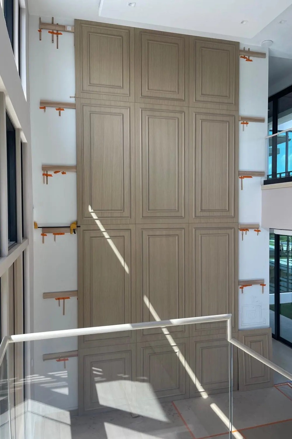 Custom paneled millwork installed by Sunshine Alliance in a South Florida home