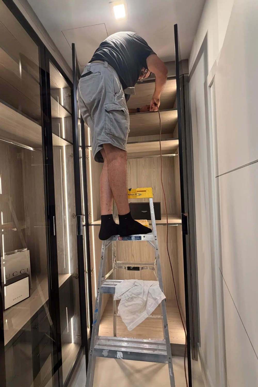 Sunshine Alliance in-house crew installing custom cabinets in a Boca Raton home, South Florida