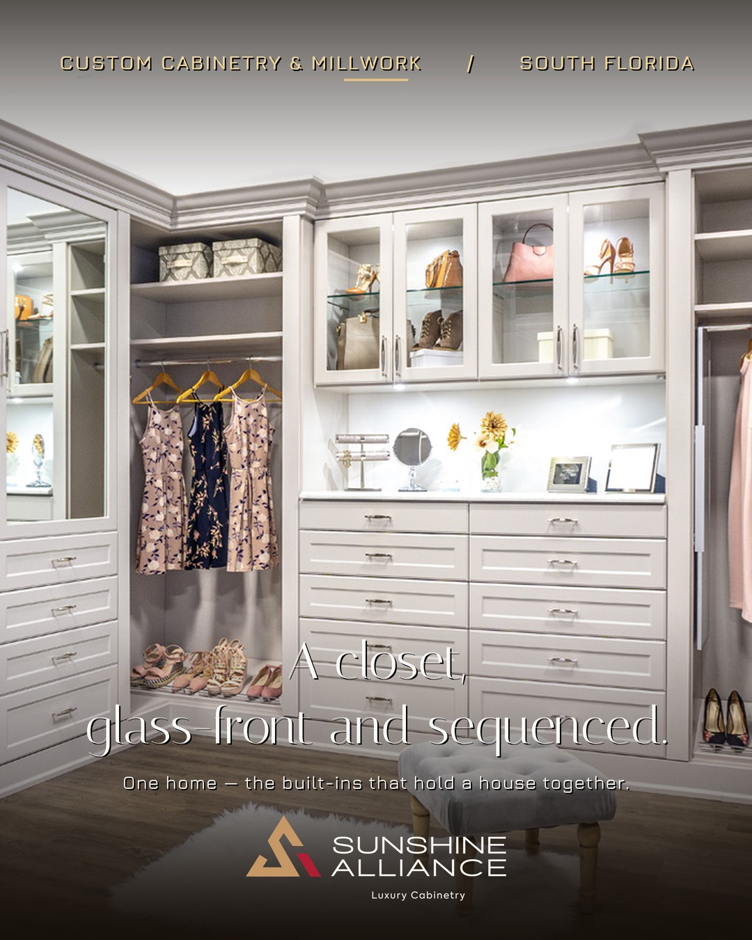 Custom glass-front walk-in closet cabinetry by Sunshine Alliance, designed and built in Deerfield Beach, South Florida