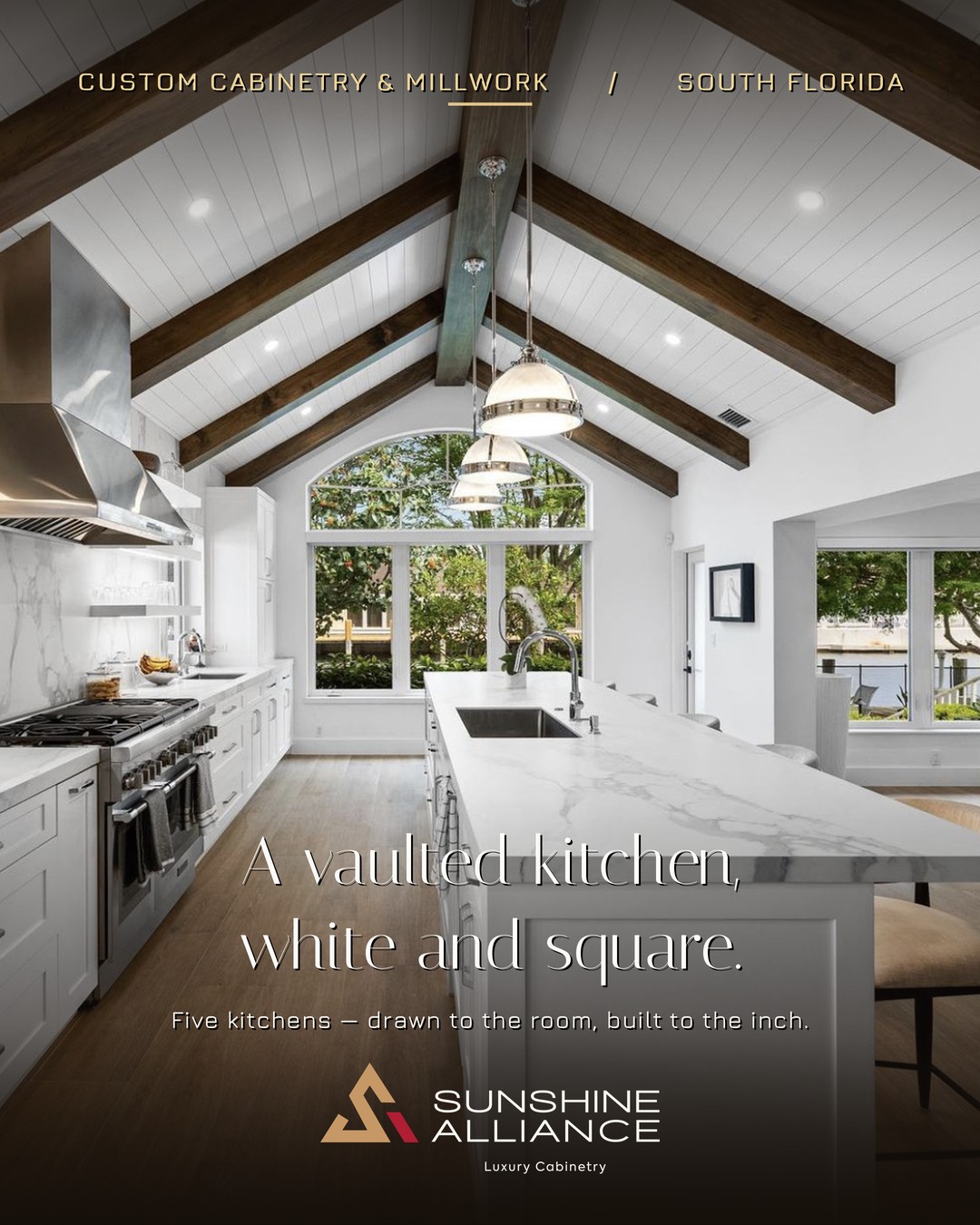 Custom white kitchen cabinetry, vaulted ceiling by Sunshine Alliance, designed and built in Deerfield Beach, South Florida