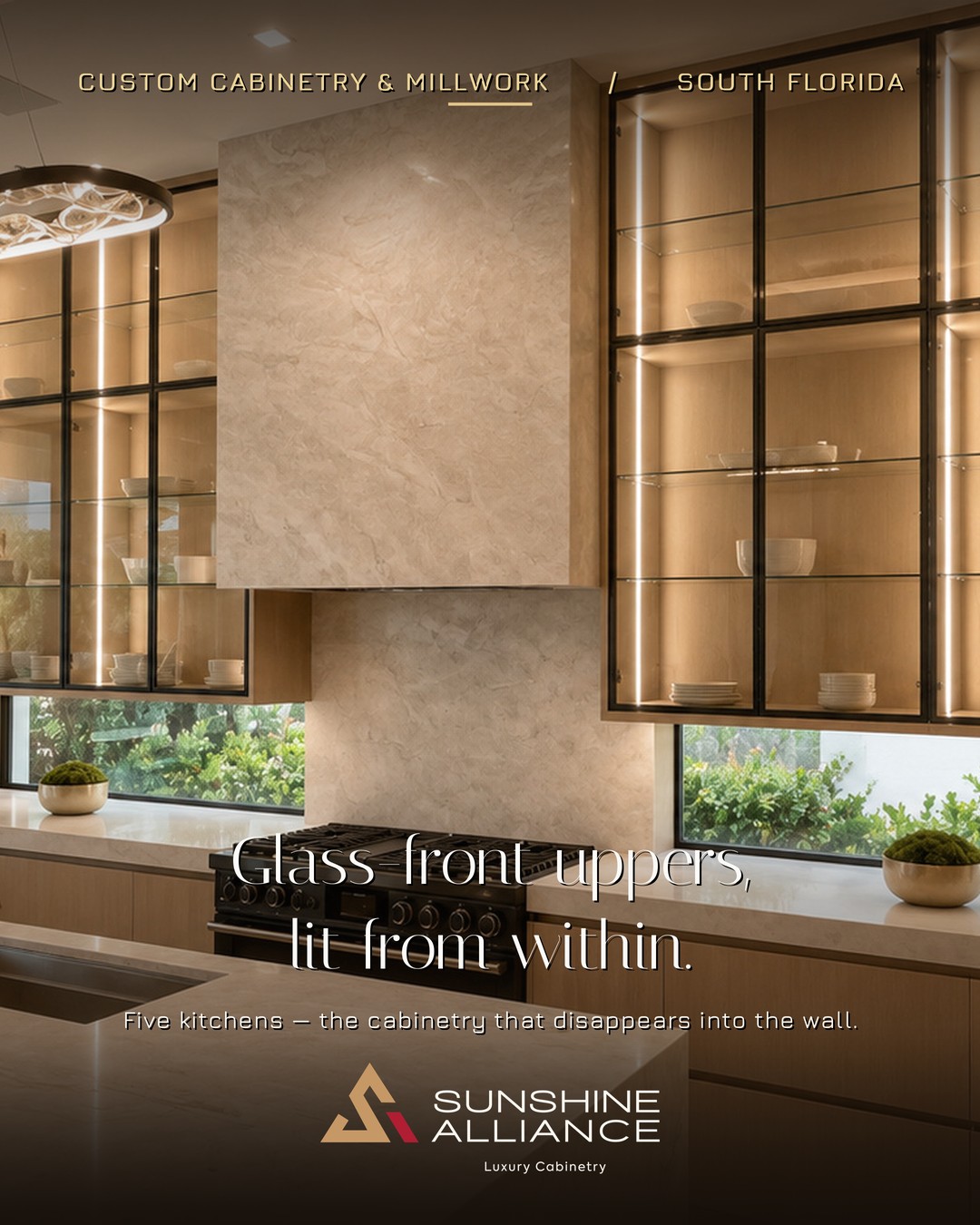 Custom lit glass-front kitchen cabinetry by Sunshine Alliance, designed and built in Deerfield Beach, South Florida
